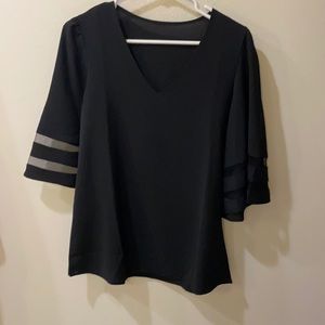 Black blouse with mesh detail